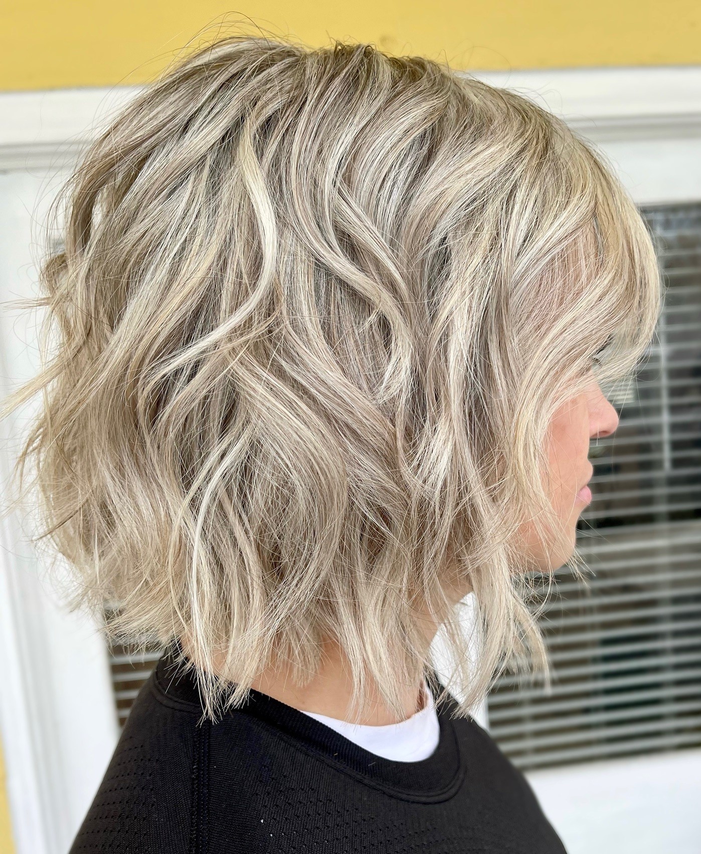 Dirty Blonde Layered Wavy Bob