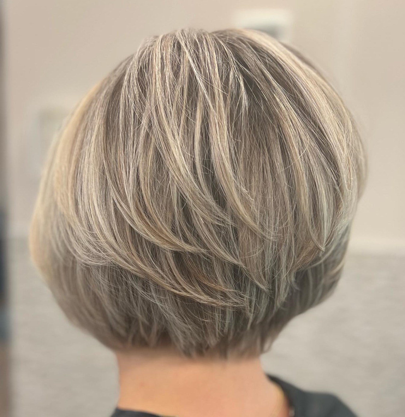 Rounded Bob with Delicate Swoopy Layers